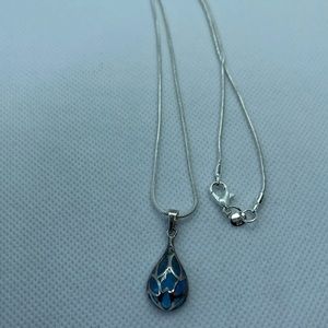 Sterling silver necklace with clear blue glass stone 18”